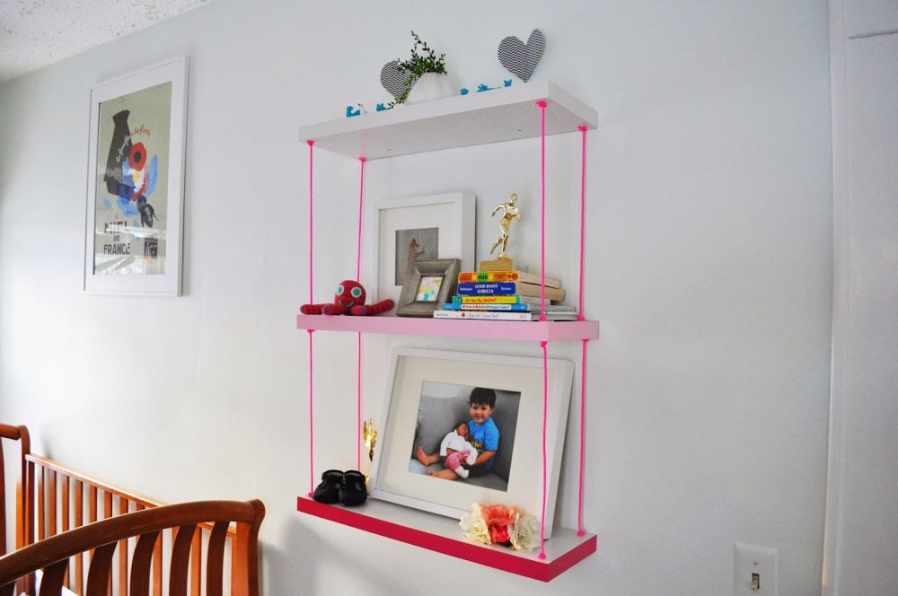 Hanging ombre shelves with pink rope