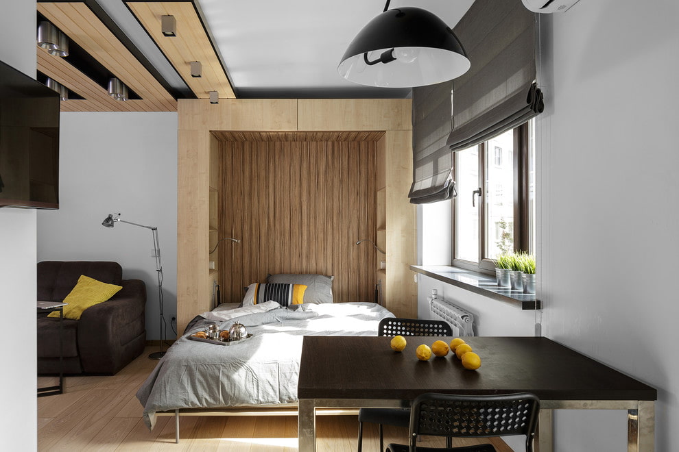 Дизайн квартиры студийной планировки с кроватью в нише
