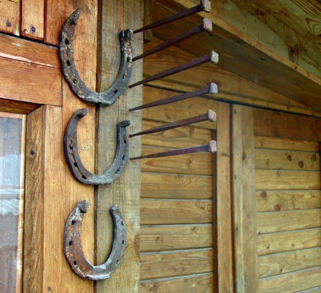 A horseshoe with horns up is a symbol of prosperity in a house