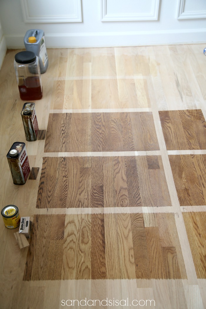 Choosing Floor Stains: Top- bottom- 1) Waterborn clear coat 2) Polyurethane 3) DuraSeal Nutmeg Stain 4) Duraseal Provincial Stain 5) Minwax Weathered Oak. Note: DuraSeal Stains are by Minwax. Left side 80 grit sanded, right side 150 gril sanded. The level of sanding effects the stain appearance.
