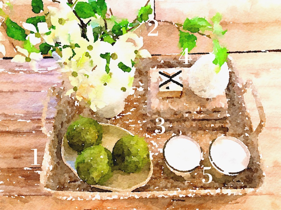 watercolor rendering of a coffee table vignette